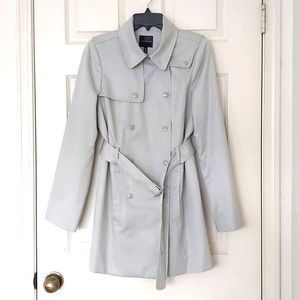 NWT. The Limited Double Breasted Trenchcoat w/full lining, belt and pockets.